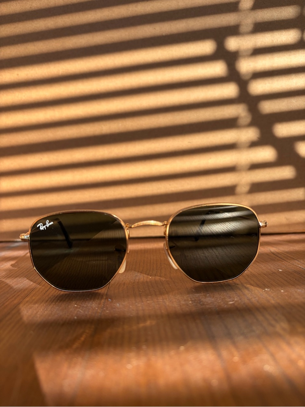 Ray-Ban Gold Frame Sunglasses with Dark Green Lenses and Hexagonal Shape